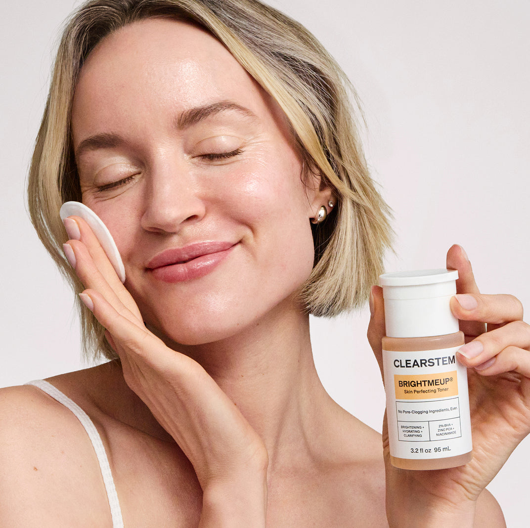 BRIGHTMEUP Advanced Brightening Toner bottle held by woman