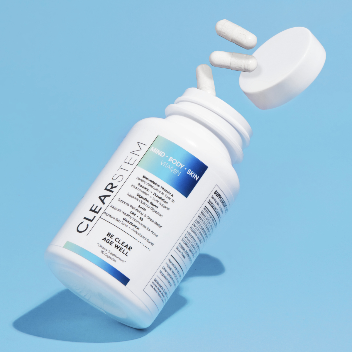 clearstem mindbodyskin hormonal acne supplement bottle with blue background
