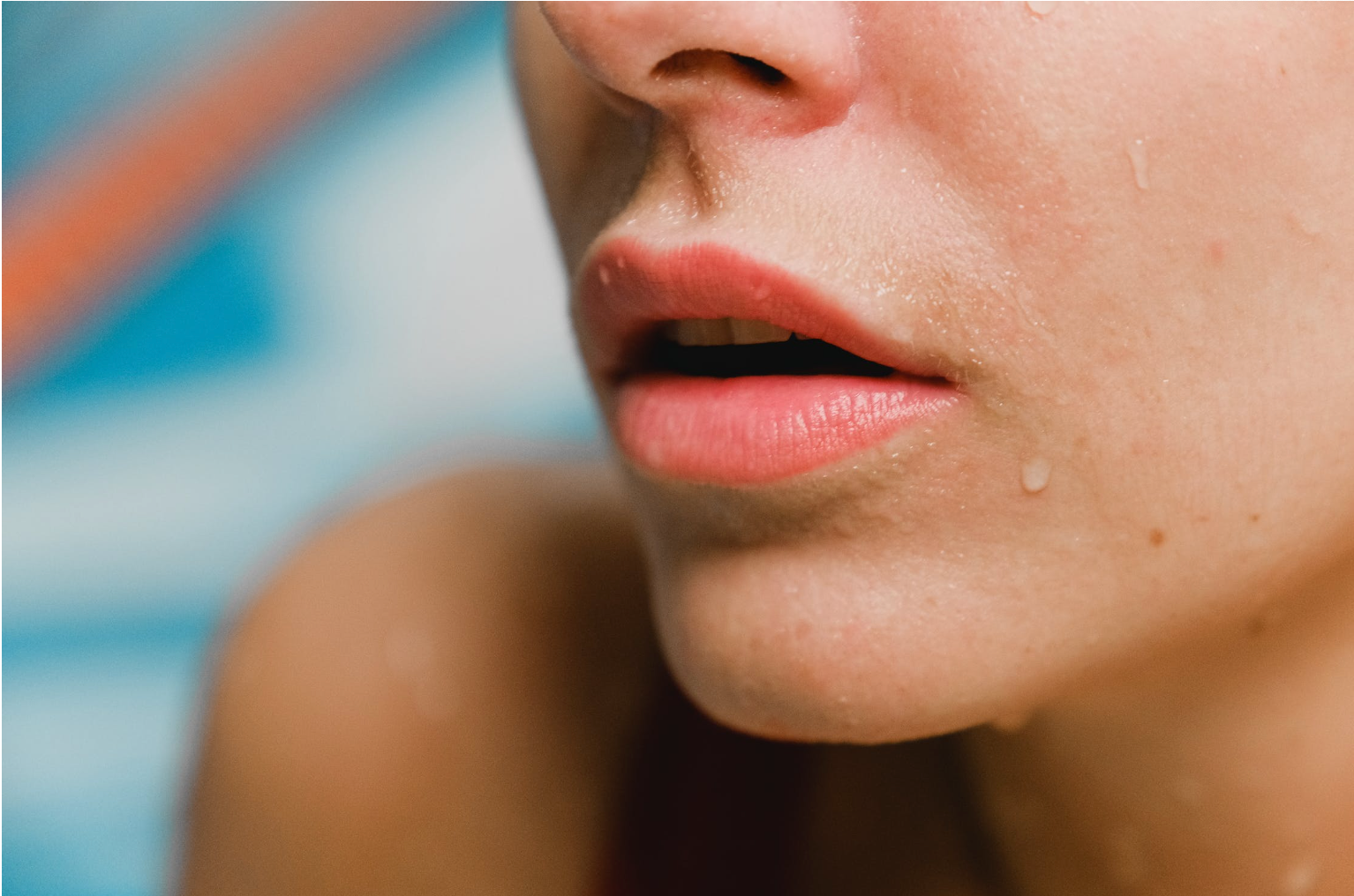 Close up of woman's lips with no pimples or acne