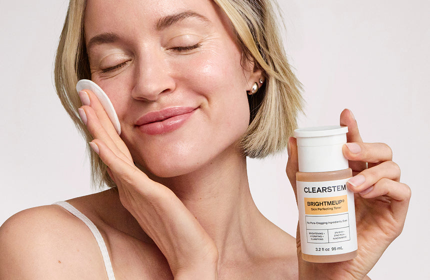 BRIGHTMEUP Advanced Brightening Toner bottle held by woman